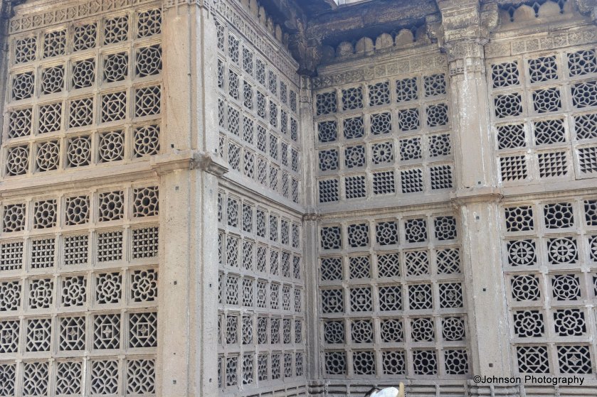 The lattice work inside the mausoleum